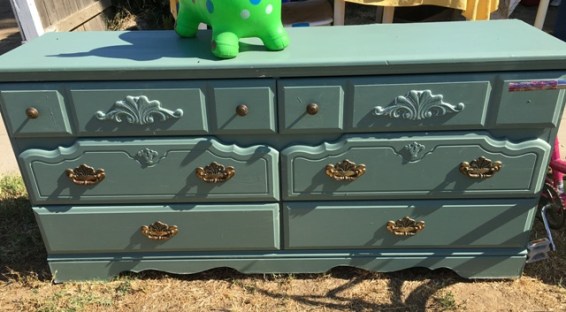 blue dresser at yard sale