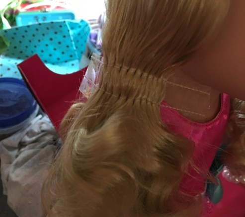hair sewn togther