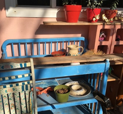 blue changing table with items